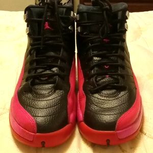 Pink and black Jordan jumpman high tops